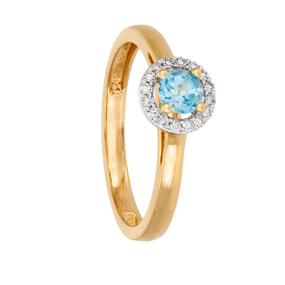 Diamantring i 18K guld med en topas, 17.0