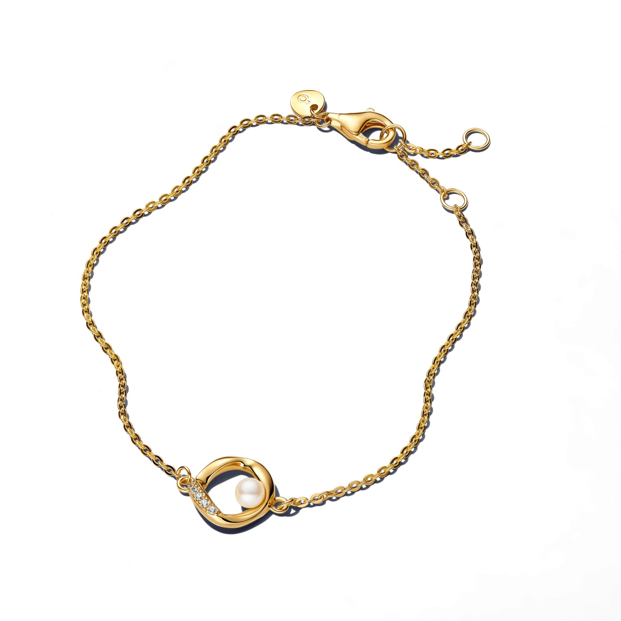 F&ouml;rgyllt armband med cirkel och s&ouml;tvattensp&auml;rla 18cm